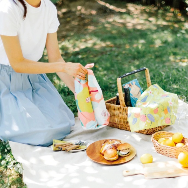 Furoshiki used to wrap wine bottles at a picnic