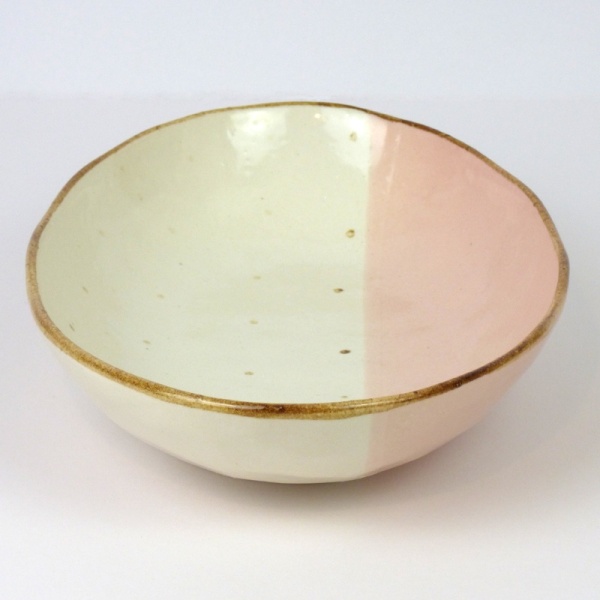 Pink and white oval curry plate showing dip glaze design