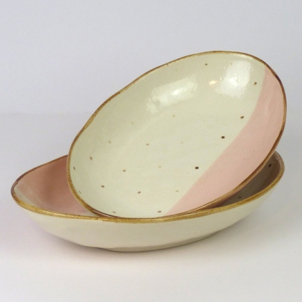 Two stacked Japanese ceramic oval curry dishes