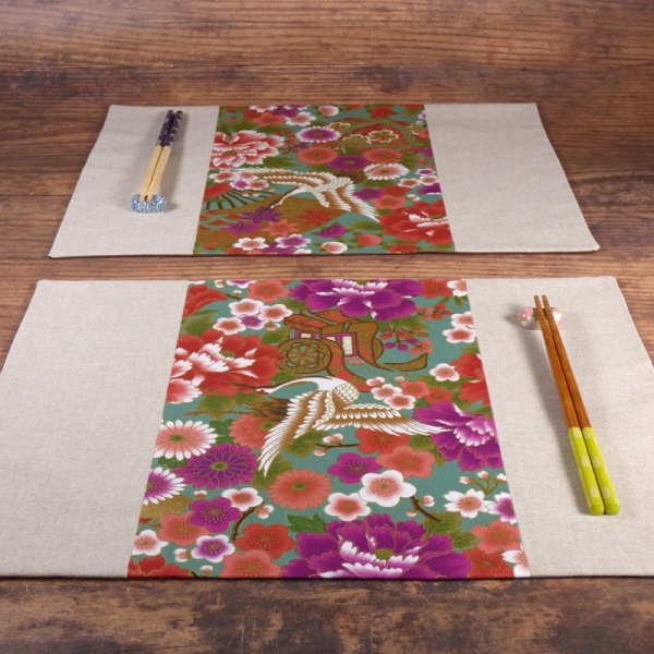 Two Japanese fabric placemat with vibrant cranes design