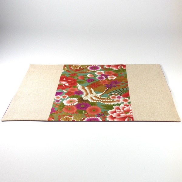 Japanese fabric placemat with vibrant cranes design
