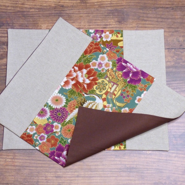 Two Japanese fabric placemat with vibrant cranes design