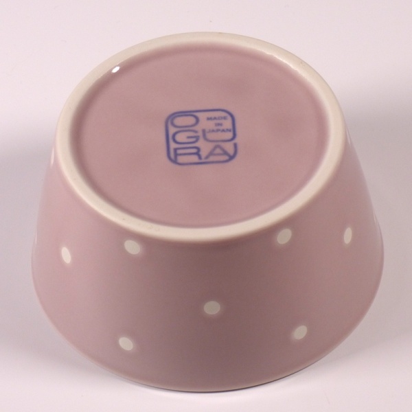 Underside of Small mauve ceramic food storage and microwave dish