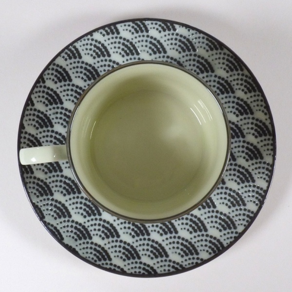 Monochrome Qinghai wave pattern coffee cup with saucer, top down view