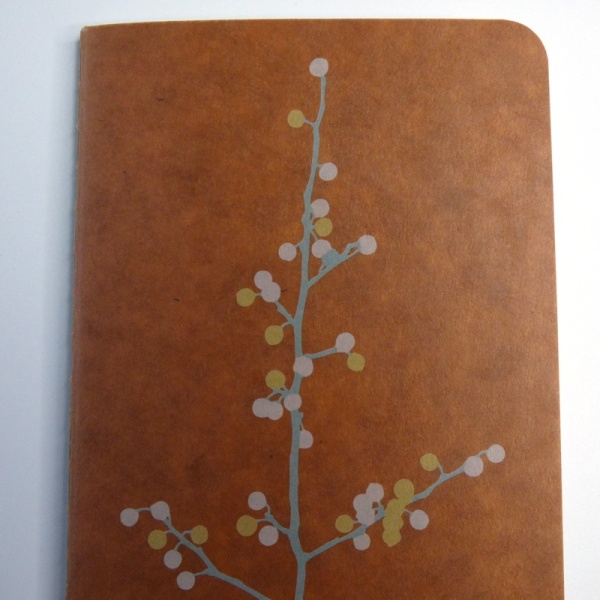 Close up of waxed cover design of Blossom Branch notebook