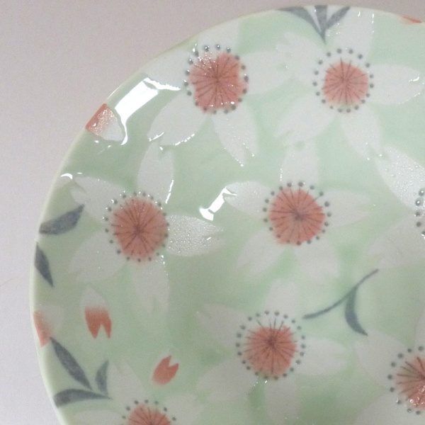 'Sakura Temari' ceramic bowl in Green, close up of blossom pattern