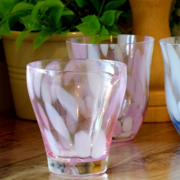 Pink 'Sakura' glass tumbler and matching glass jug in kitchen