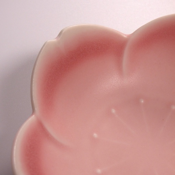 Close up of pink sakura flower shaped bowl