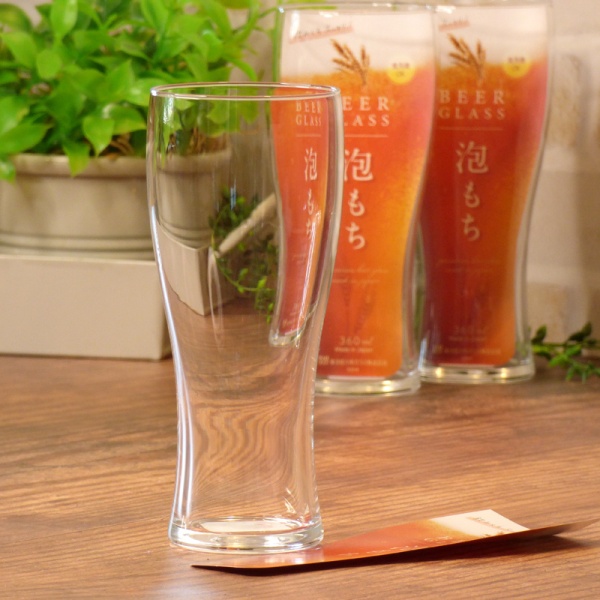 Slim Japanese beer glass on table
