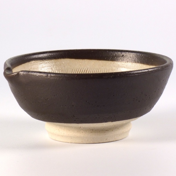 Small Japanese suribachi bowl with black glaze