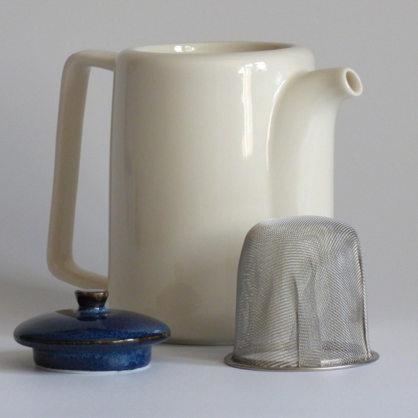 Tall white Japanese teapot with dark blue lid & infuser