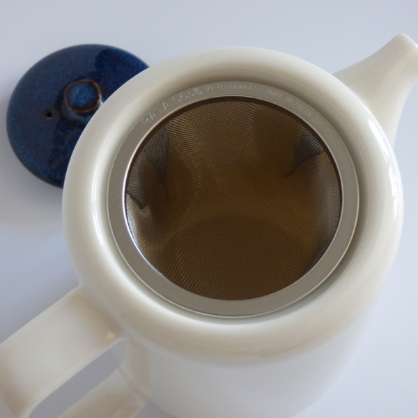 White Japanese teapot infuser detail