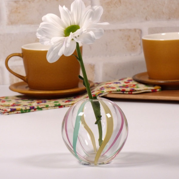 Small Japanese vase with single large daisy flower