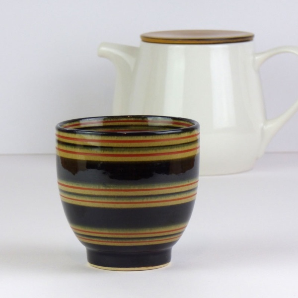 Black Japanese tea cup with Japanese teapot