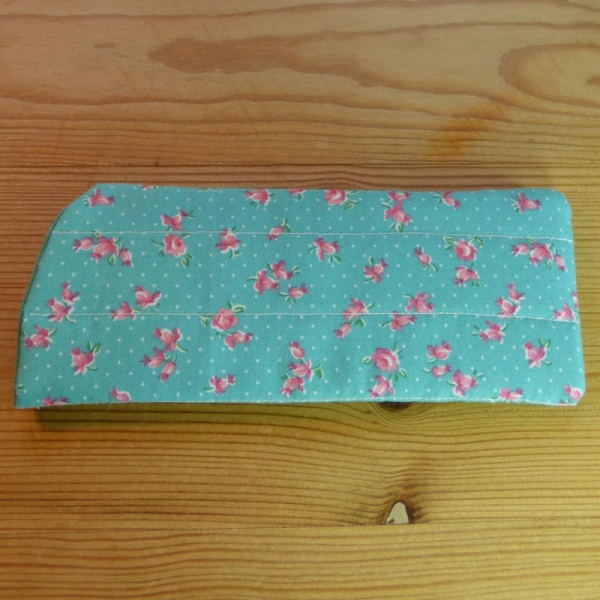 Handmade quilted glasses case in turquoise rose print