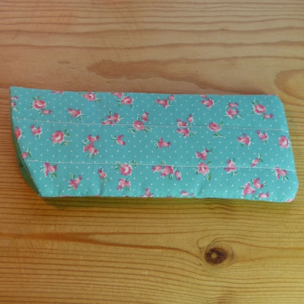 Handmade quilted glasses case in turquoise rose print