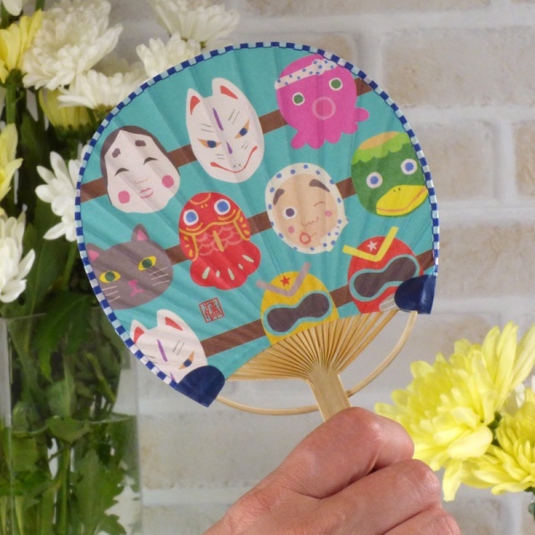 Japanese traditional summer fan held in hand