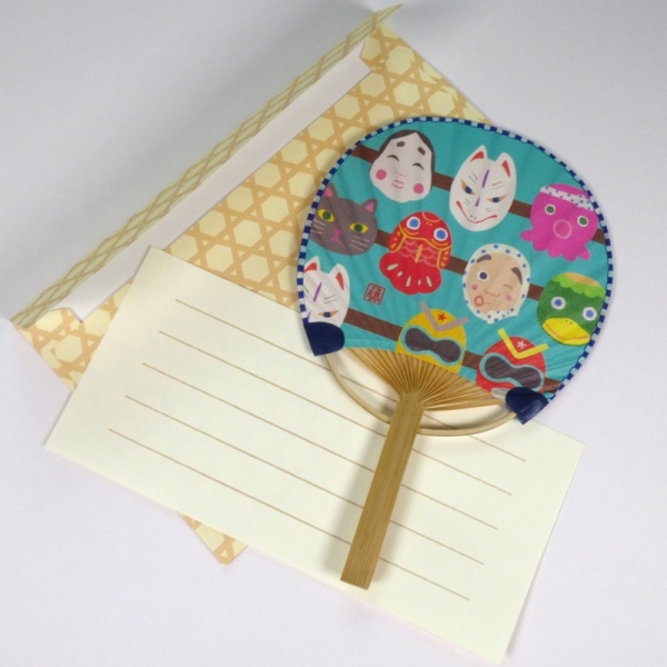 Japanese round uchiwa fan with traditional masks design with matching envelope and notelet