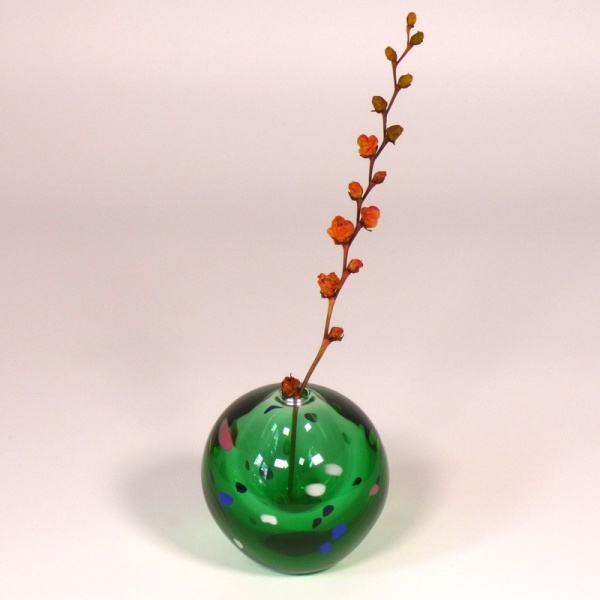 Japanese green glass vase with mini ikebana arrangement