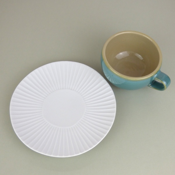 White daisy plate with blue Celadon-glaze mug