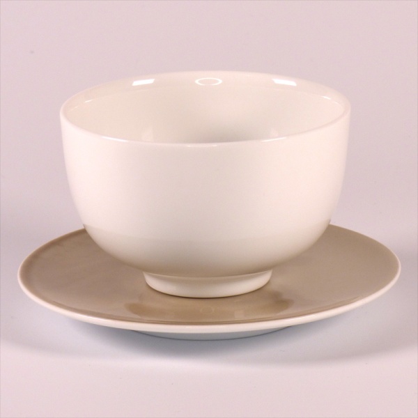 White porcelain Japanese tea cup with grey saucer