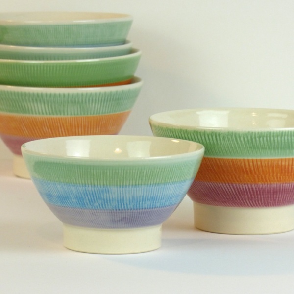 Japanese ceramic bowl with green, blue and purple striped pattern