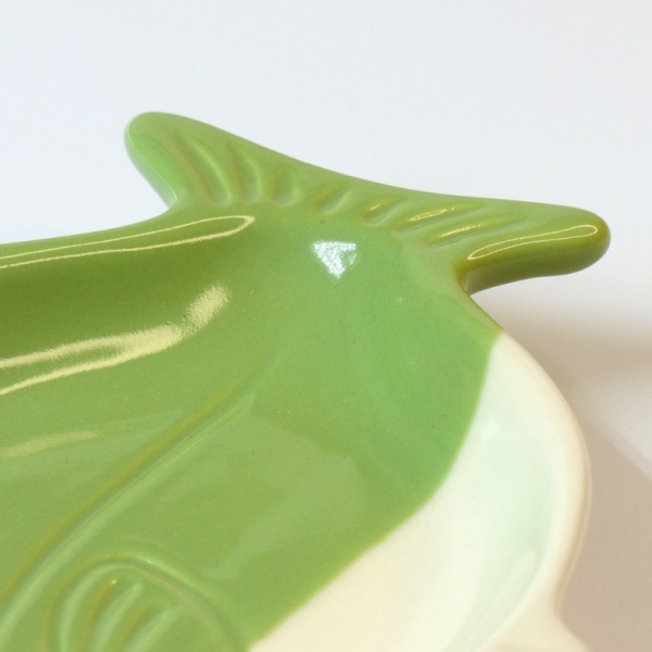 Close up of textured details on yellowtail design dish