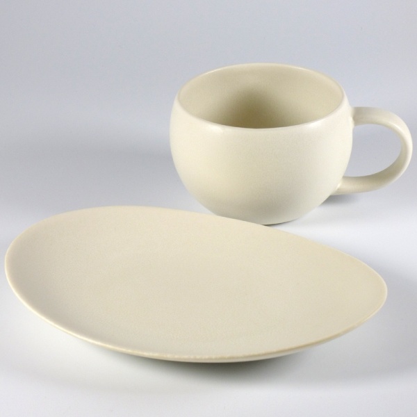 White Japanese cup and oval saucer side plate
