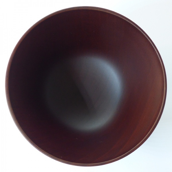Interior surface of dark wood Japanese bowl