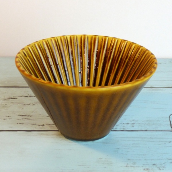 Caramel-coloured ceramic coffee filter cone