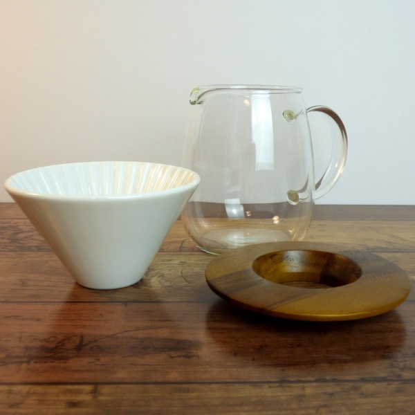 Pour-over coffee jug with white ceramic coffee filter cone
