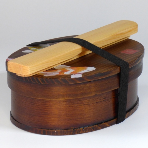 Closed wooden nishikigoi design bento box with wooden chopsticks