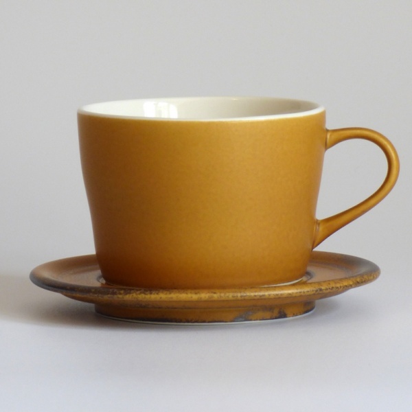 Caramel coloured Japanese cup and saucer