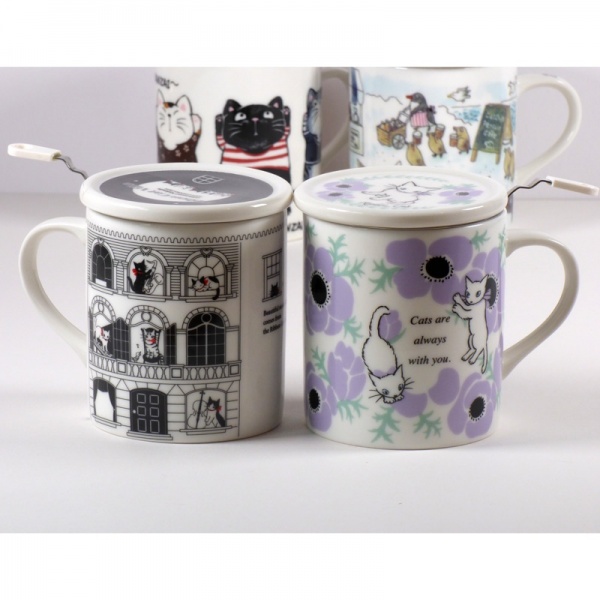 Collection of cat design mugs