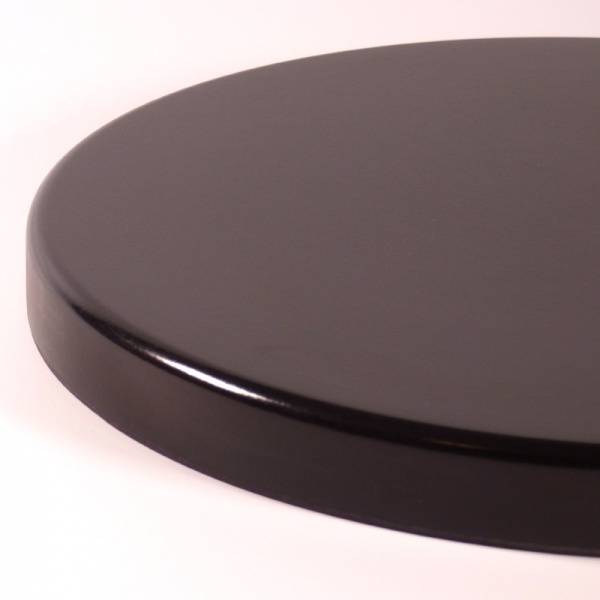 Glossy black underside of round Japanese tray