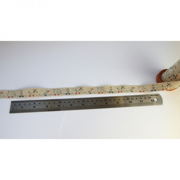 Toys linen tape alongside ruler