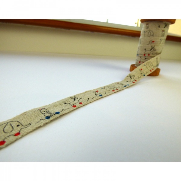 Toys linen tape on wooden reel detail