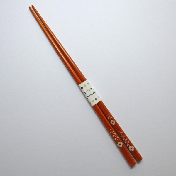Mid tone natural wood Japanese chopsticks with flower designMid tone natural wood Japanese chopsticks with flower design