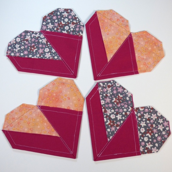 Set of 4 Origami Heart shaped fabric coasters in Autumn berry colours