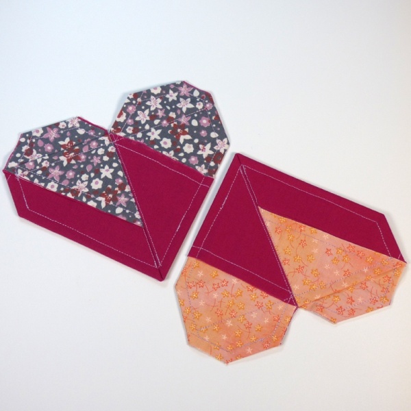 2 Origami Heart fabric coasters in berry colours