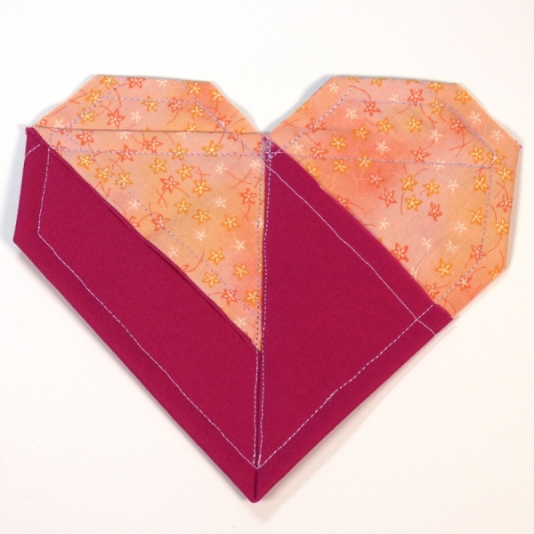 Origami Heart fabric coaster in peach and berry pink