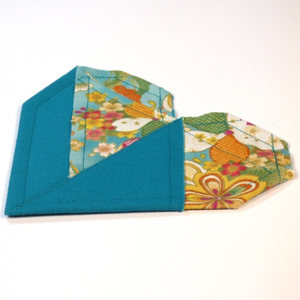 Single Japanese fabric heart shaped coaster in turquoise