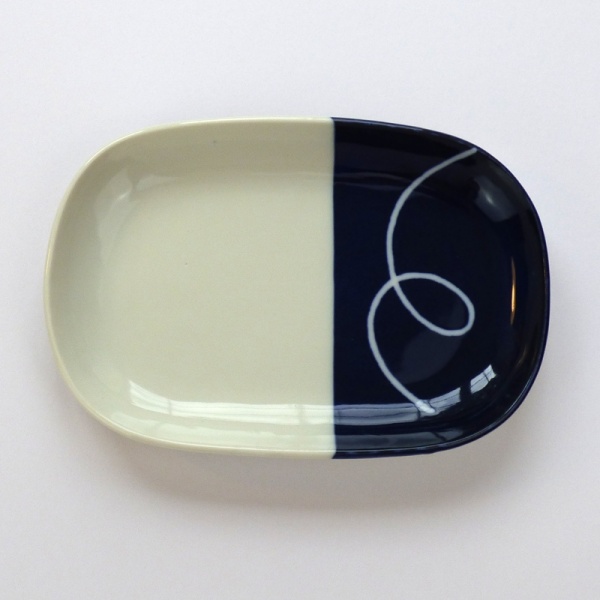 Oval Japanese ceramic plate with navy blue dipped glaze design