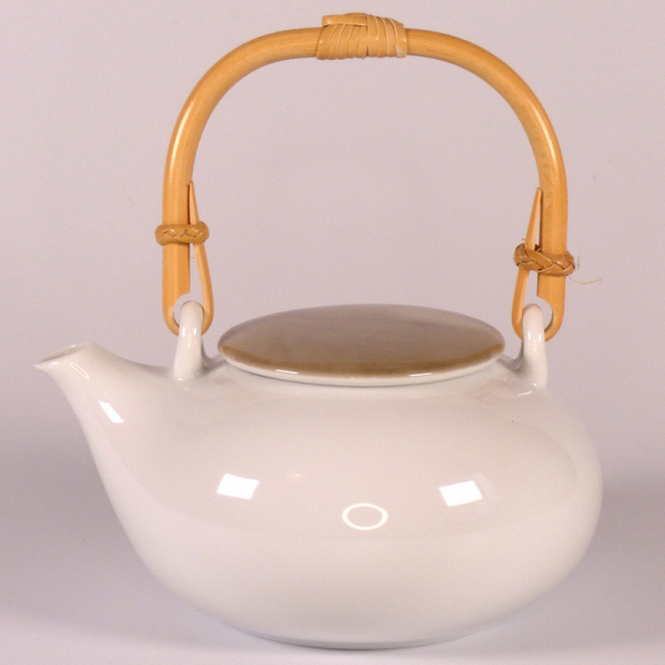 White Japanese teapot with grey lid and bamboo handle