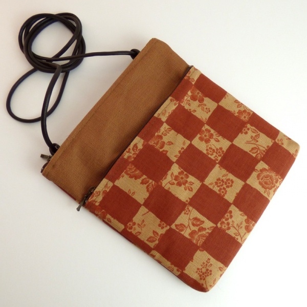 Small canvas handbag in brick orange with a check design