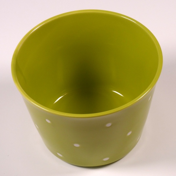 Inside surface of large green ceramic storage dish
