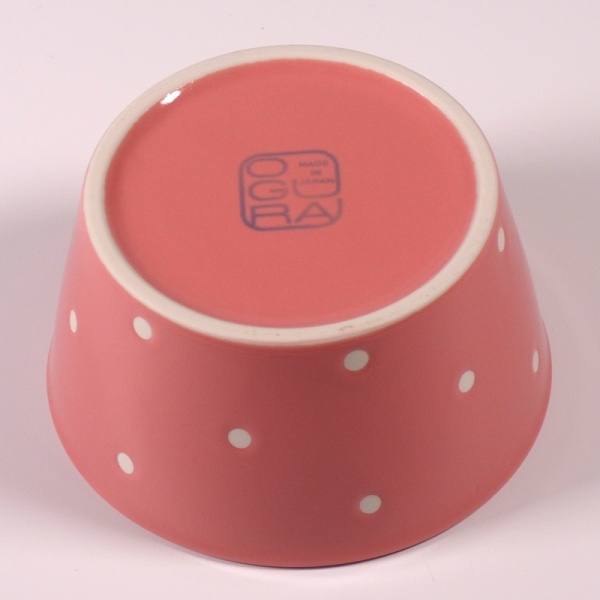 Underside of Small pink ceramic food storage and microwave dish