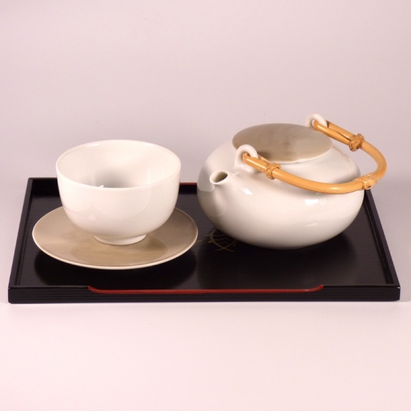 Japanese teacup and teapot of small black lacquered tray