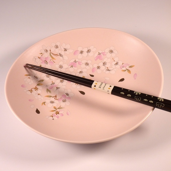 Japanese pink and gold sakura design dish with chopsticks