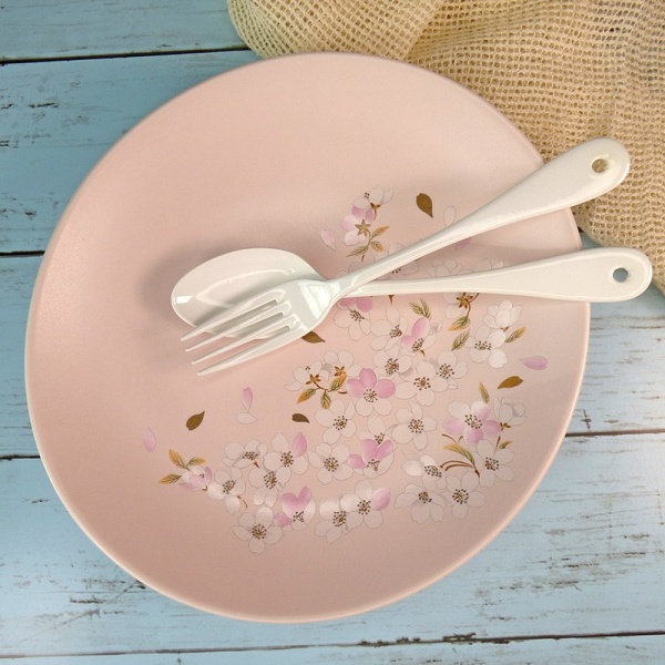 Pale pink Japanese oval plate with white enamel cutlery